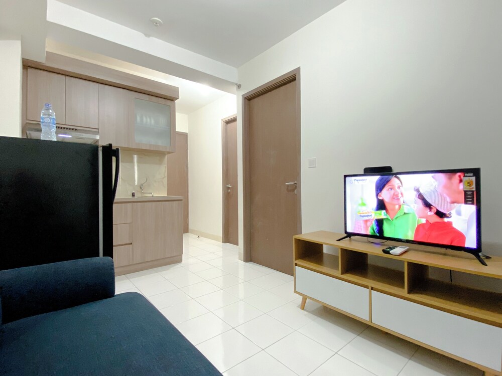Warm and Homey 2BR at Podomoro Golf View Apartment