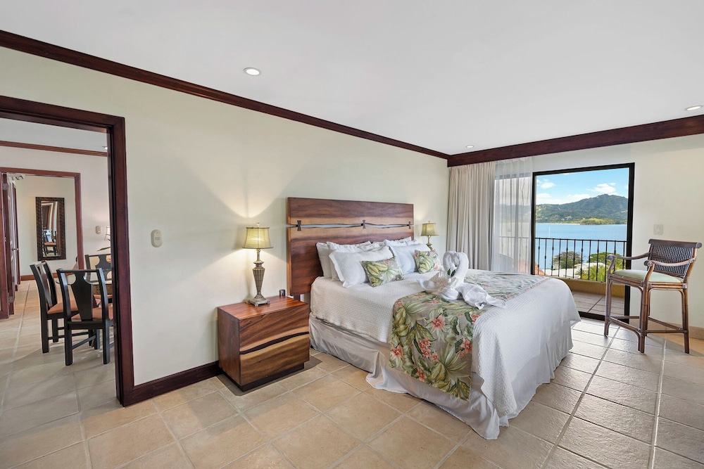 Remodeled Top-Floor Condo with Stunning Wrap-Around Balcony Offering Mountain, Ocean & Marina Views