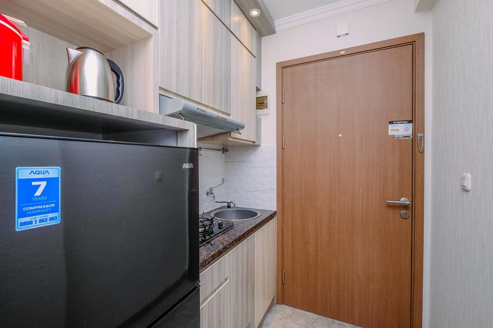 Homey Studio Room at Podomoro Golf View Apartment
