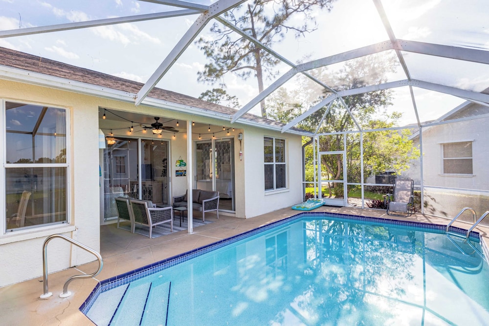 Private Pool, Pond Views, & Bonus Lounge in Gated Naples Community Drive to Dining & Sand