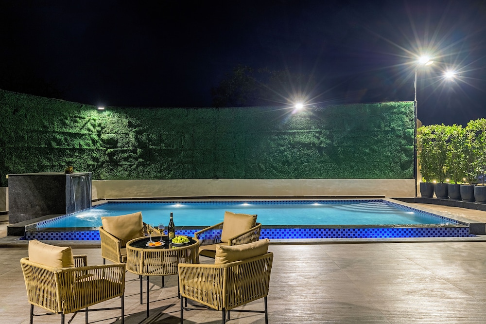 ELIVAAS Ibiza Luxe 4-BHK Farmhouse