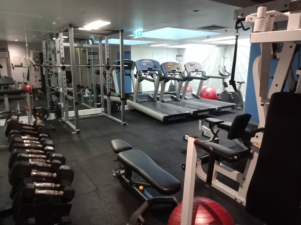 Unwind in Style at Melbourne's Historic Art Deco Apartment With Pool Gym Carpark