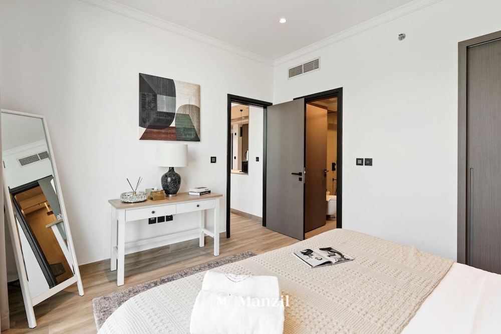 Stylish 1BR Apt w Pool in JVC nr Dubai Sports City
