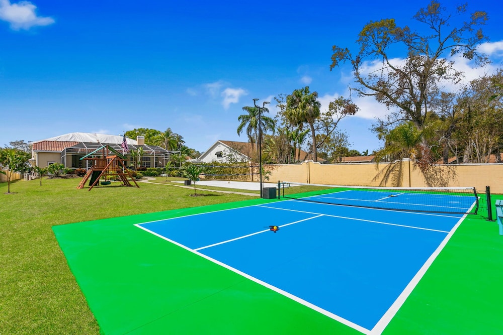 Waterfront Pool Pickleball Court Game Room