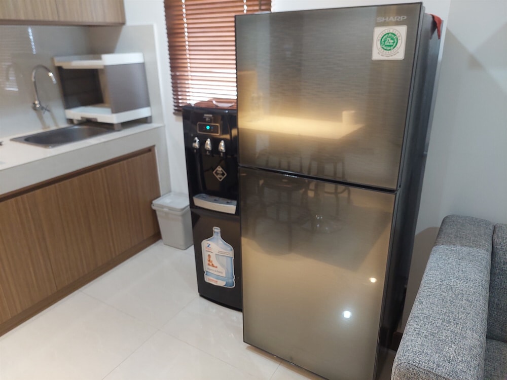 Spacious and Homey 2BR at Springwood Residence Tangerang Apartment