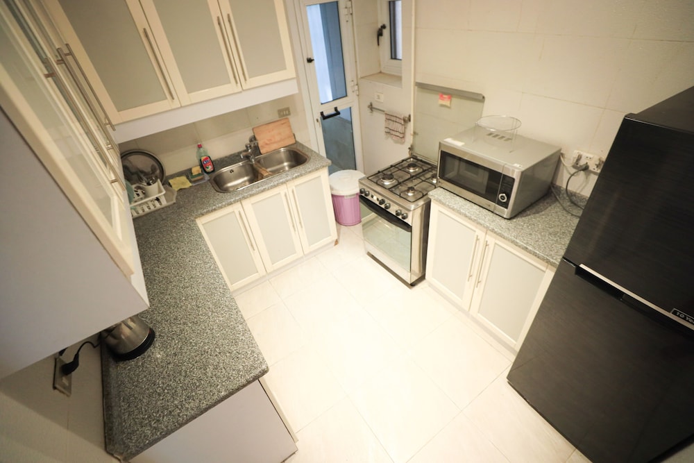 Ivory Petal Bliss 2BR Apt