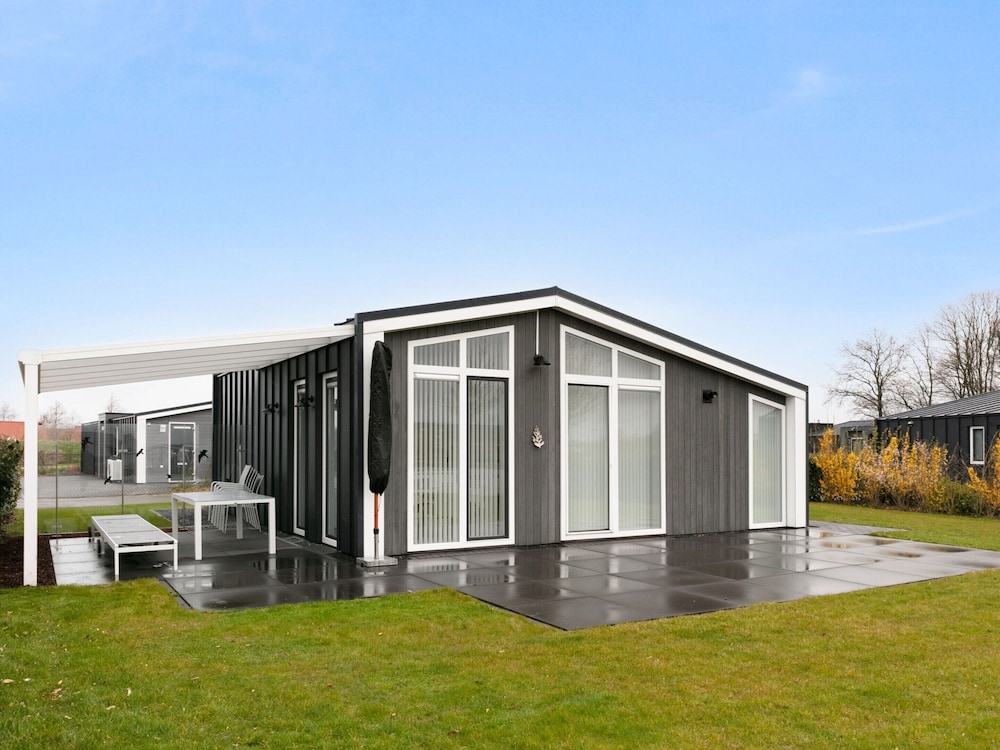 Chalet in Zeeland by Scenic Pond view 4