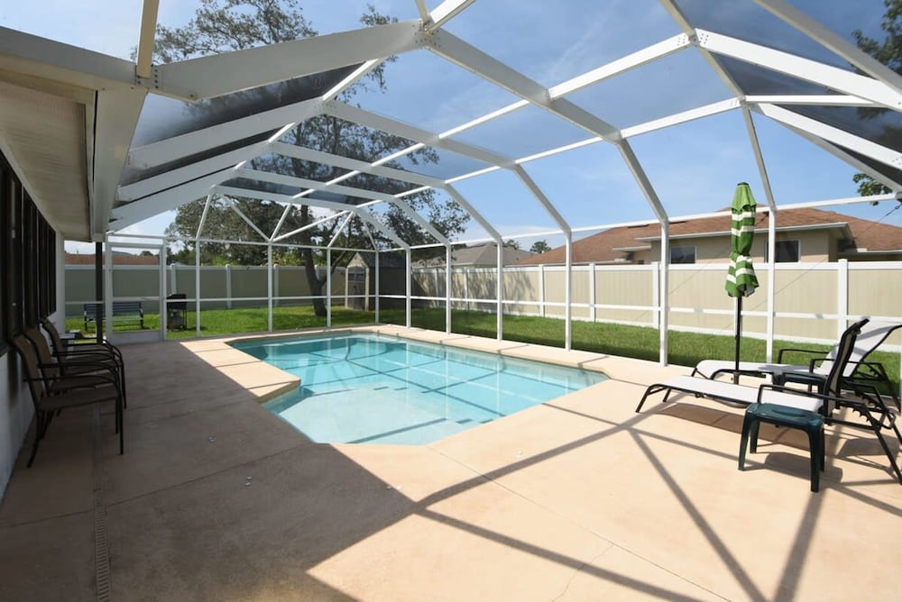 Hidden Oasis Spacious Home With Salt Water Heated Pool Hot Tub Fenced Yard Pets are Welcome