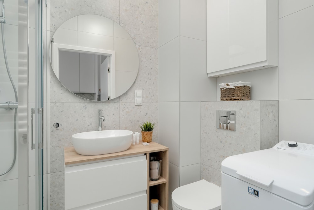 Minimalist Studios in Poznań by Renters