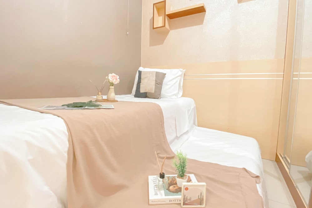 Simple Style 2Br At Green Pramuka City Apartment