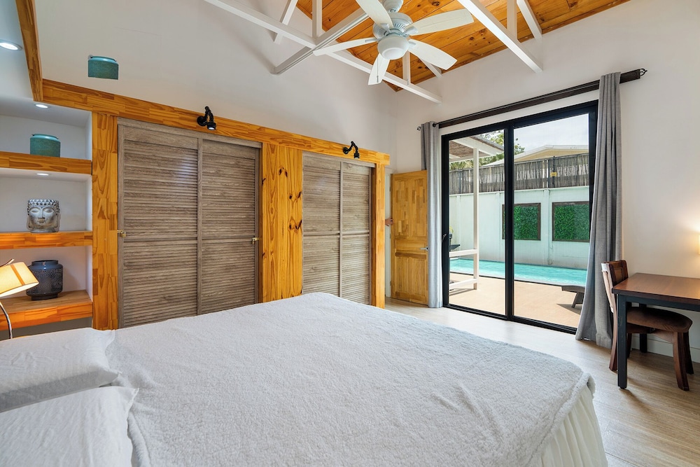 Stylish Modern Home with a Tranquil Outdoor Oasis, Spacious Open Floor Plan, and Private Swimming Pool