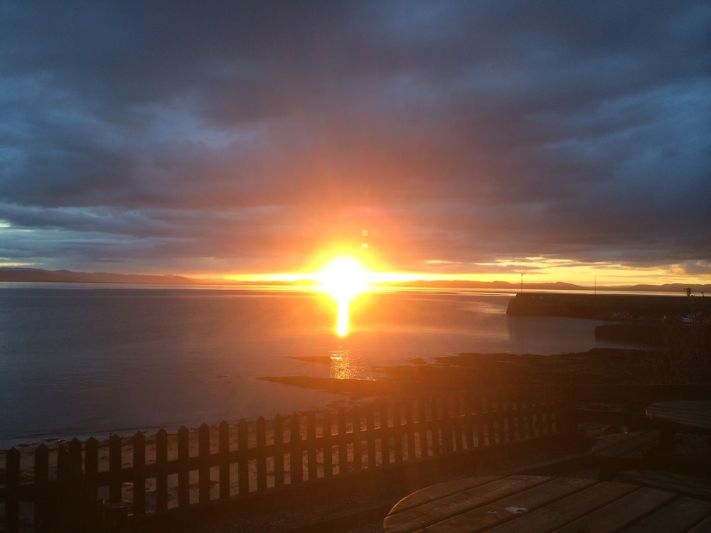 Petfriendly-beachfront-sunsetfacingsunporch-garden view 4