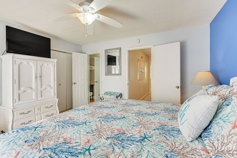 Walk to Beach: PCB Gem w/ Community Pool Access!