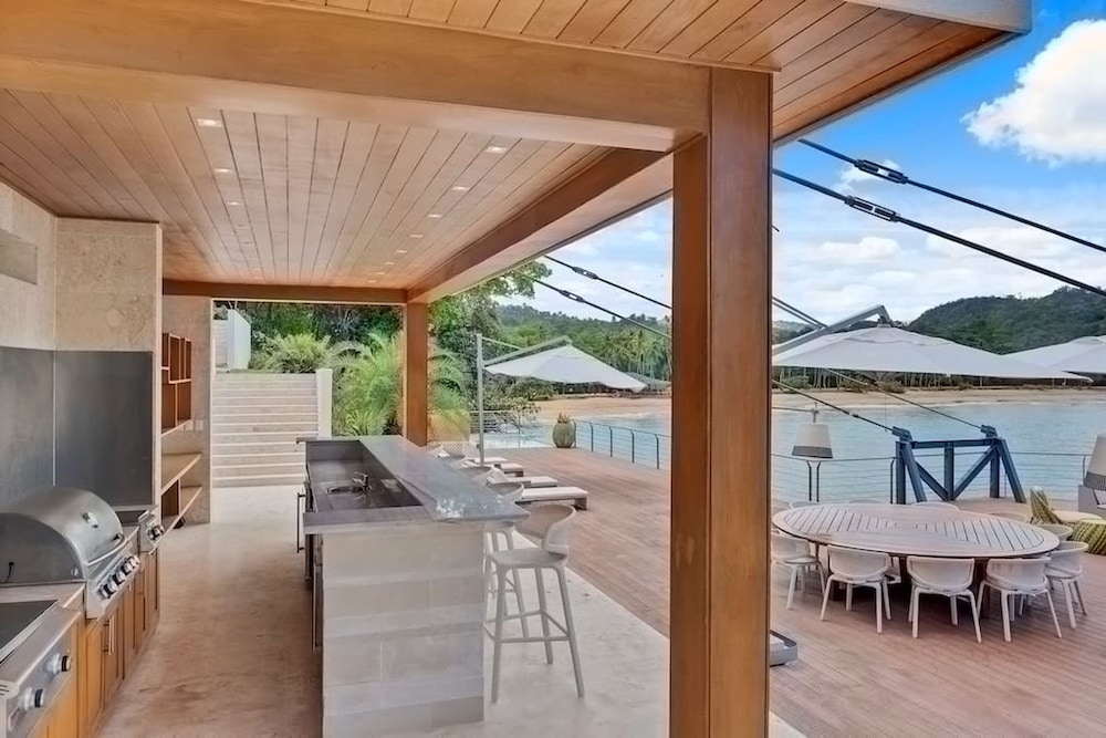 Gorgeous Beach House Perched Right Over the Ocean