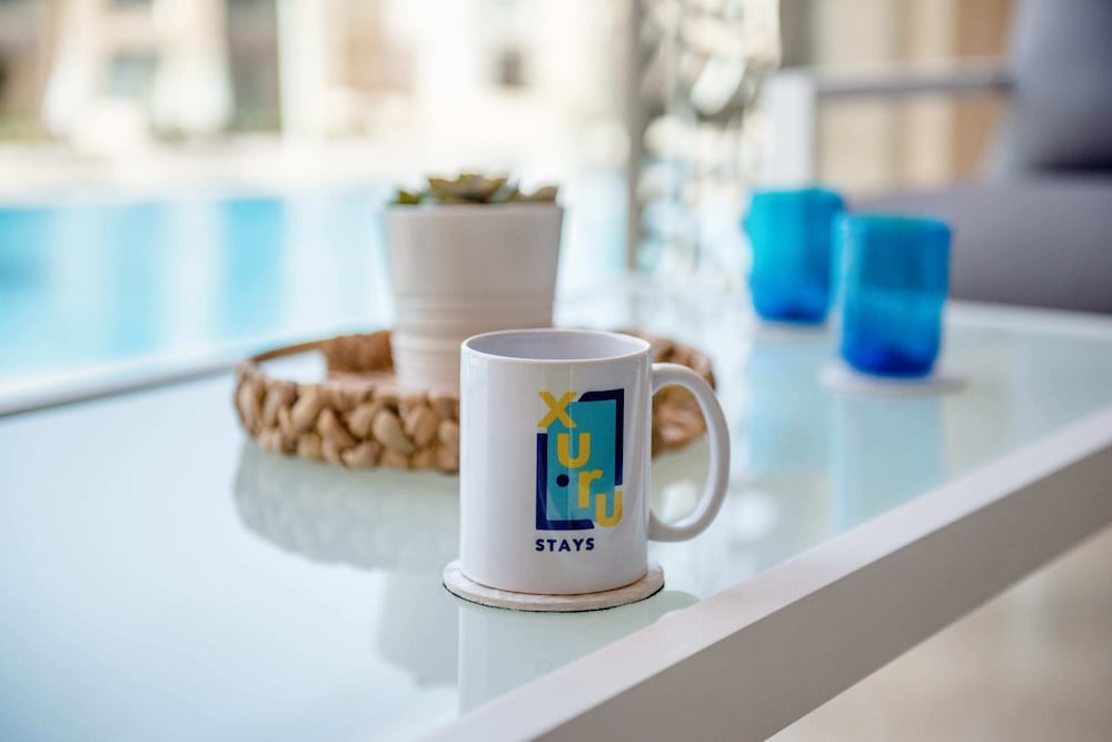 Xuru Stays I Exotic 1bdr w/ Outdoor Terrace Pool & Beach Access