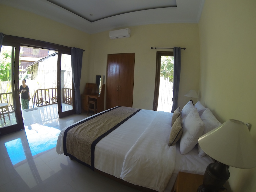 Pemuntalan Guesthouse by WizZeLa