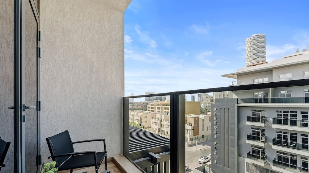 Stylish 1BR Apt w Pool in JVC nr Dubai Sports City
