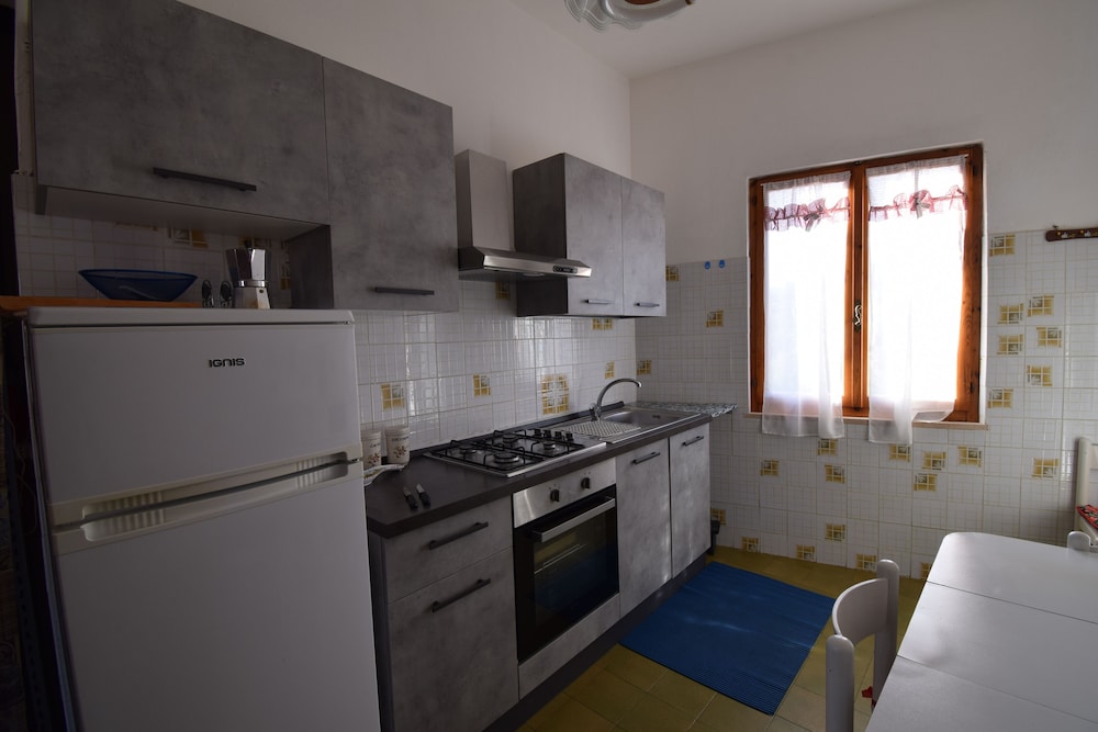 Family Apartment With Balcony In Budoni
