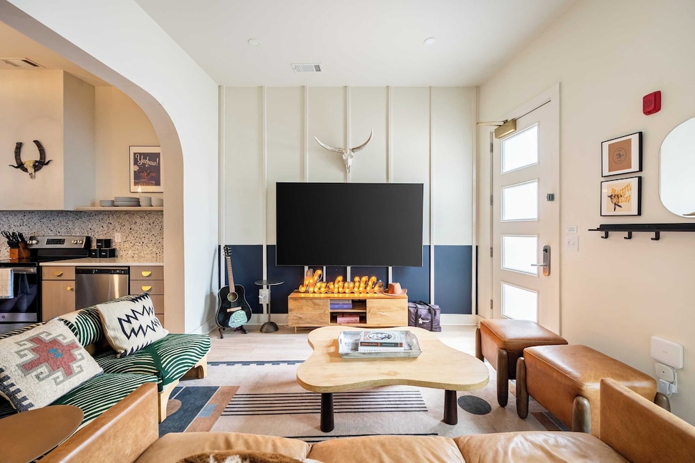Sleeps 24 Rooftop, Game Room & Outdoor Spaces Just 10 Min to Broadway Outrider by Avantstay