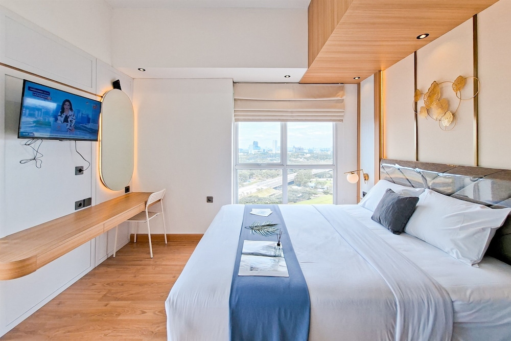 Wooden Tone Studio At Casa De Parco Apartment
