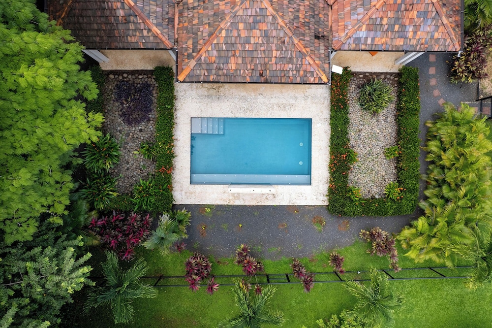 Beautiful home in a gated Neighborhood, Walking Distance to Beach with Garden