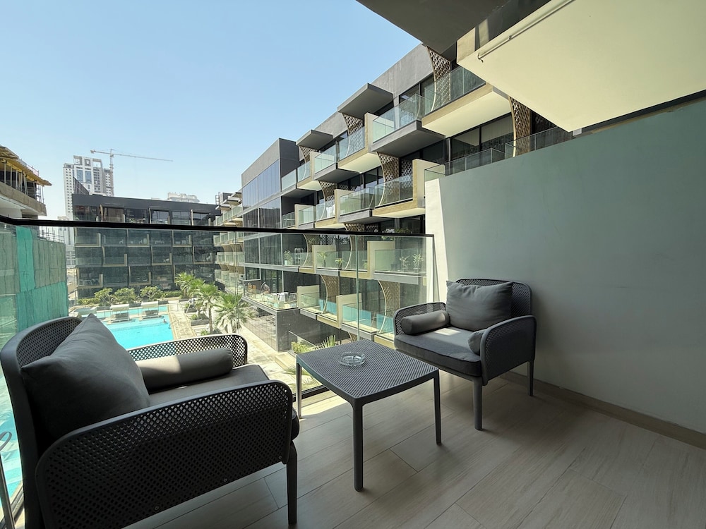 Manzil-1BR in JVC with Pool View