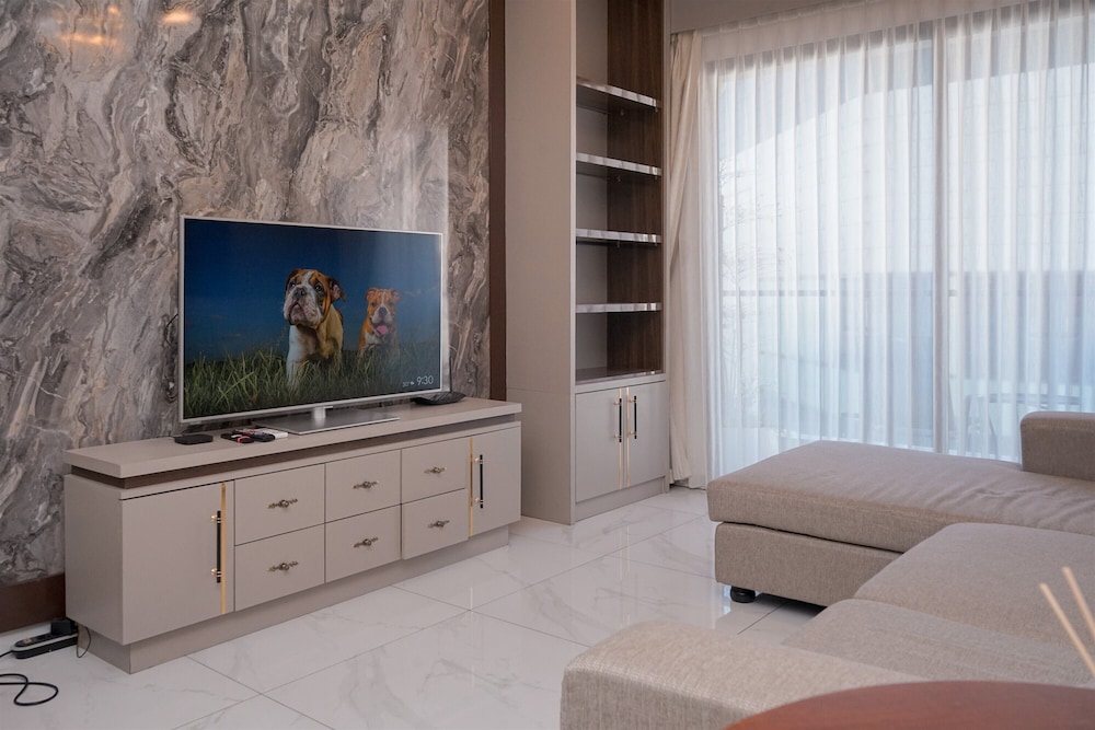Warm Living 3BR at Sky House BSD Apartment