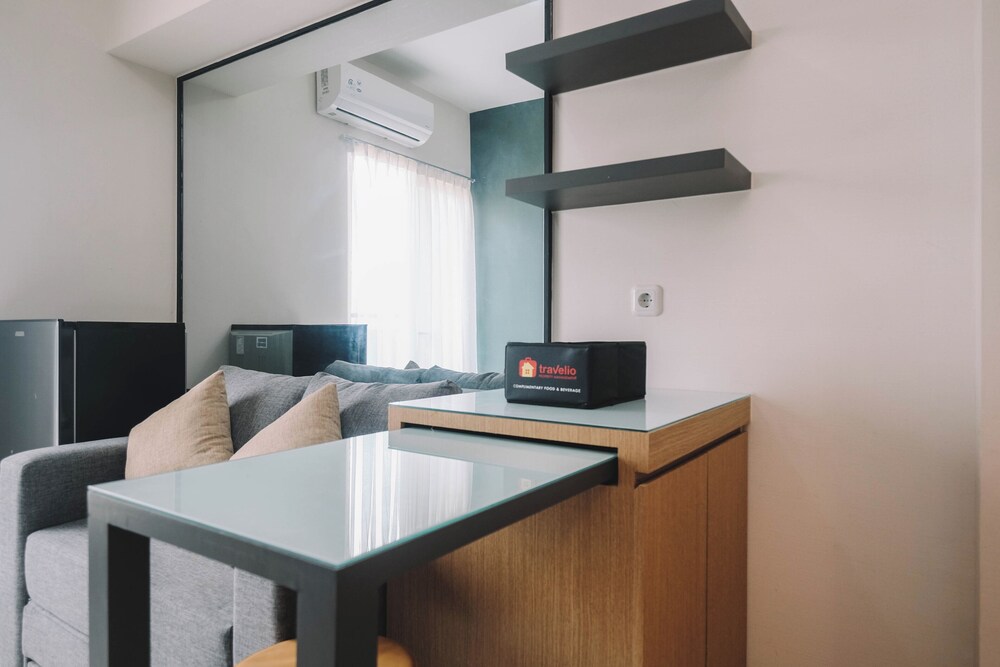 Simple and Cozy Living 2BR at Podomoro Golf View Apartment