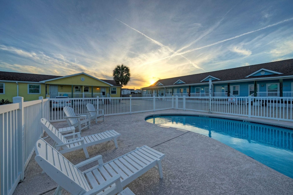 Stylish 2BR Coastal Getaway w/ Pool & Prime Location Lazy Fun