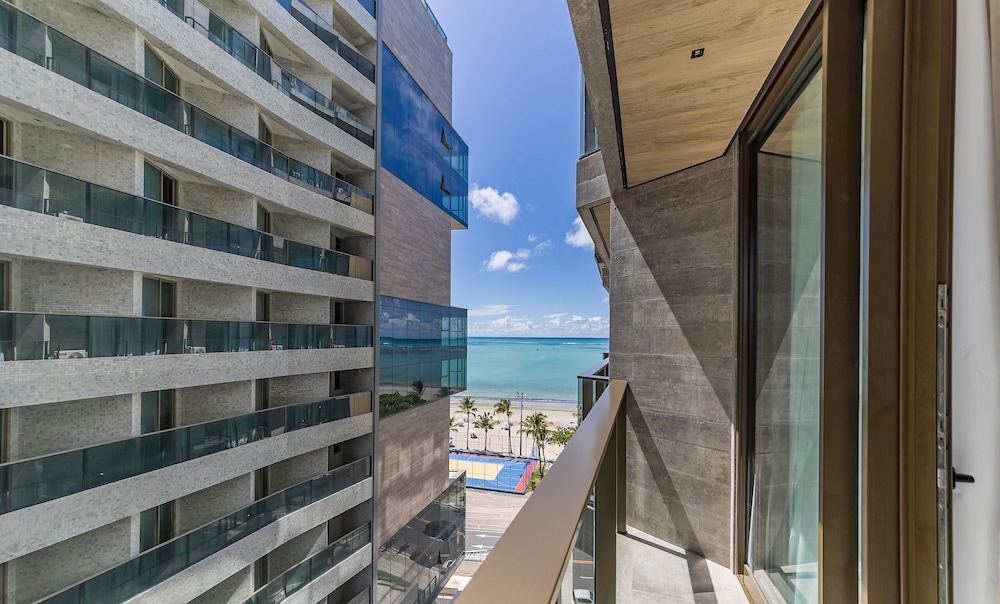 NWTs - Estúdios com Vista Lateral Mar