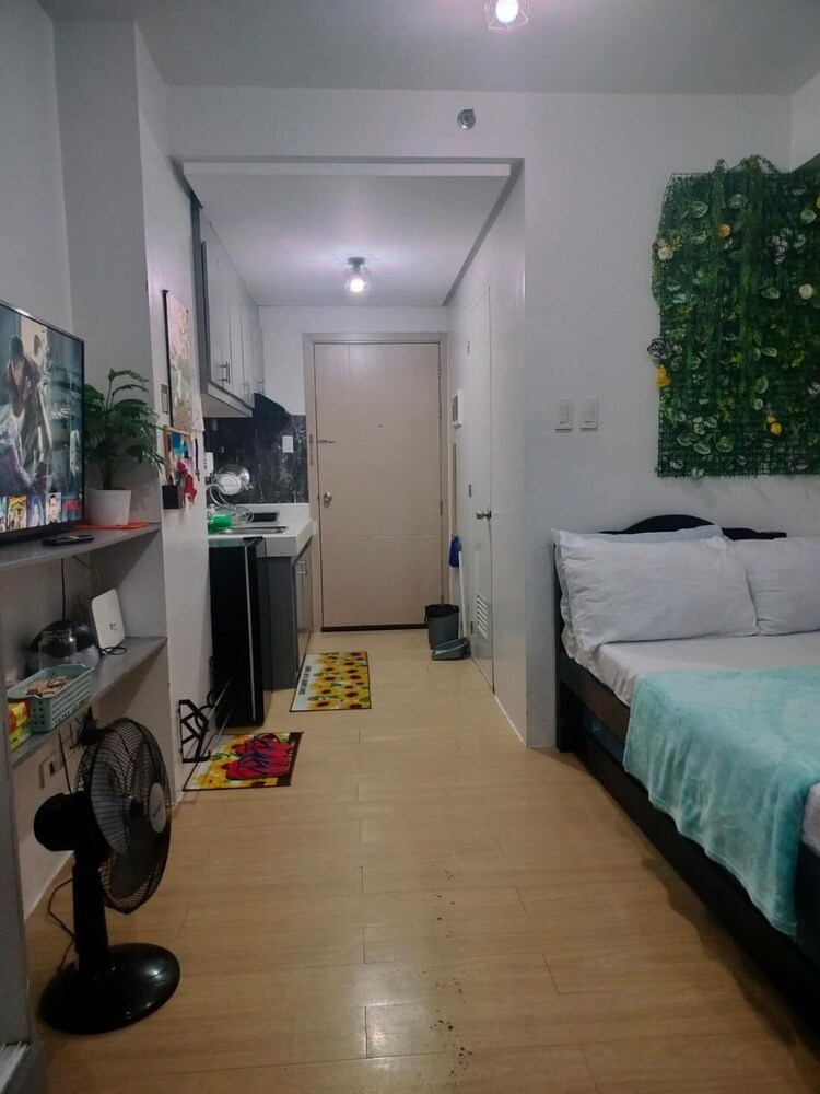 Cozy City View Condo in Quezon City - Your Home Away From Home