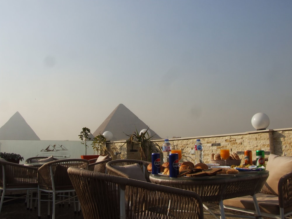 Pyramids Solar Boat Inn