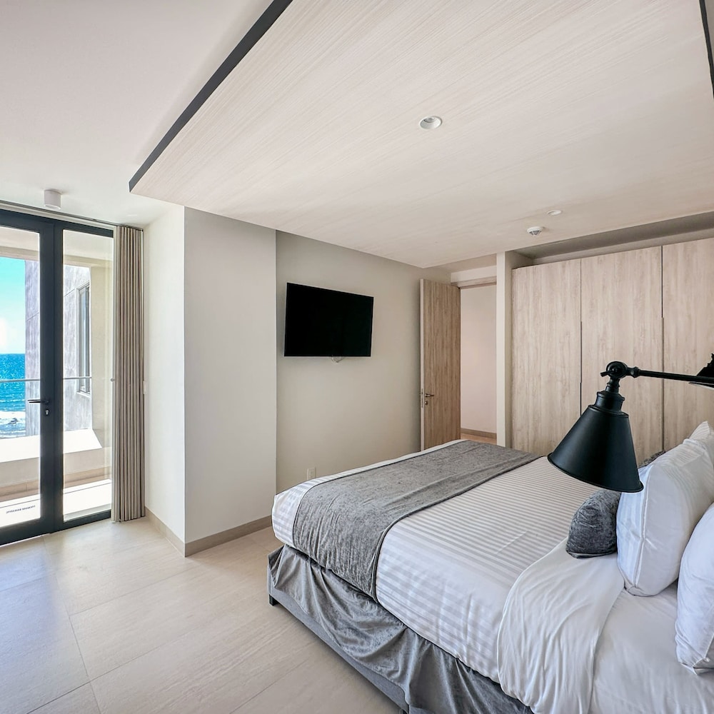 Brand-new Modern 2BR Gem on Iconic Sandy Beach