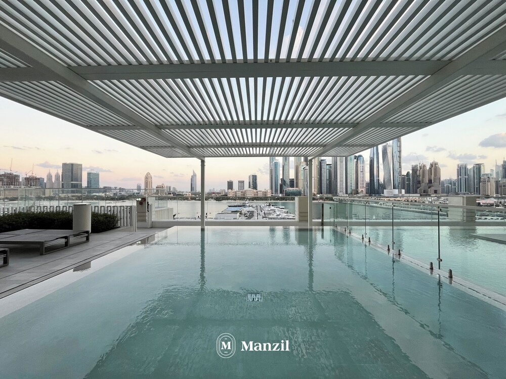 Manzil - Stylish 1BR in Emaar Beachfront
