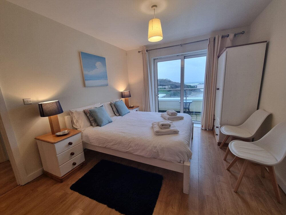 The Beach House & Porth Sands Apartments