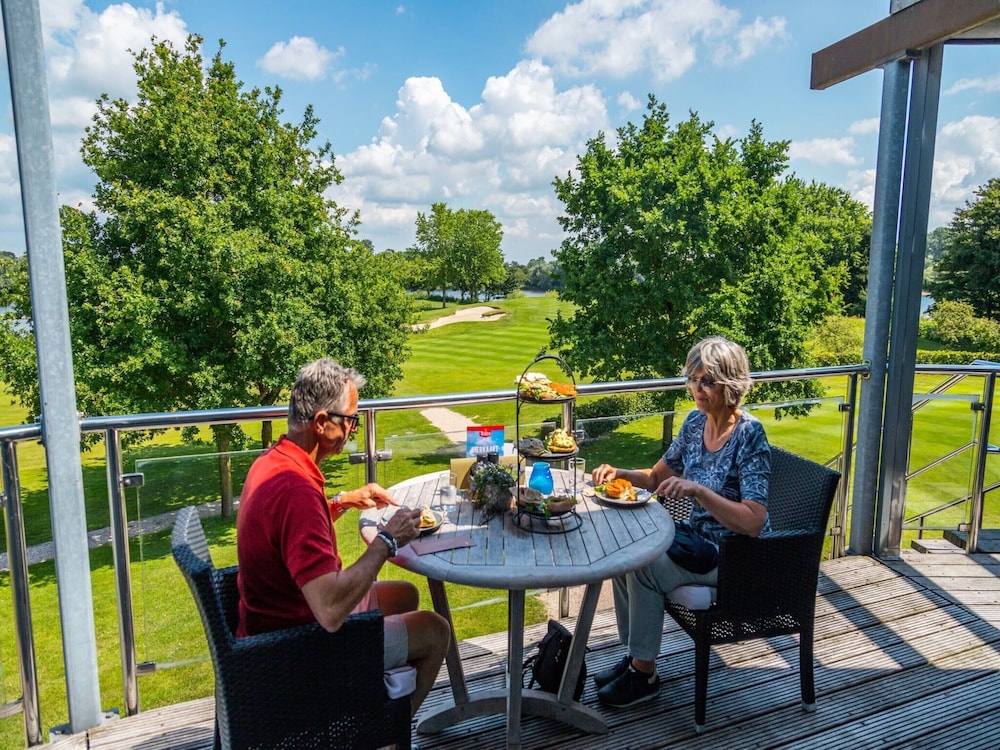 Modern Chalet by the River Maas