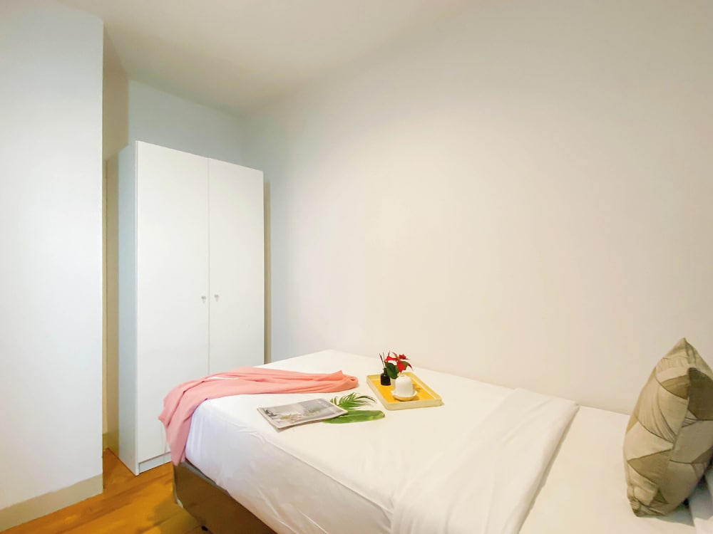 Simple 2Br At Azalea Suites Apartment