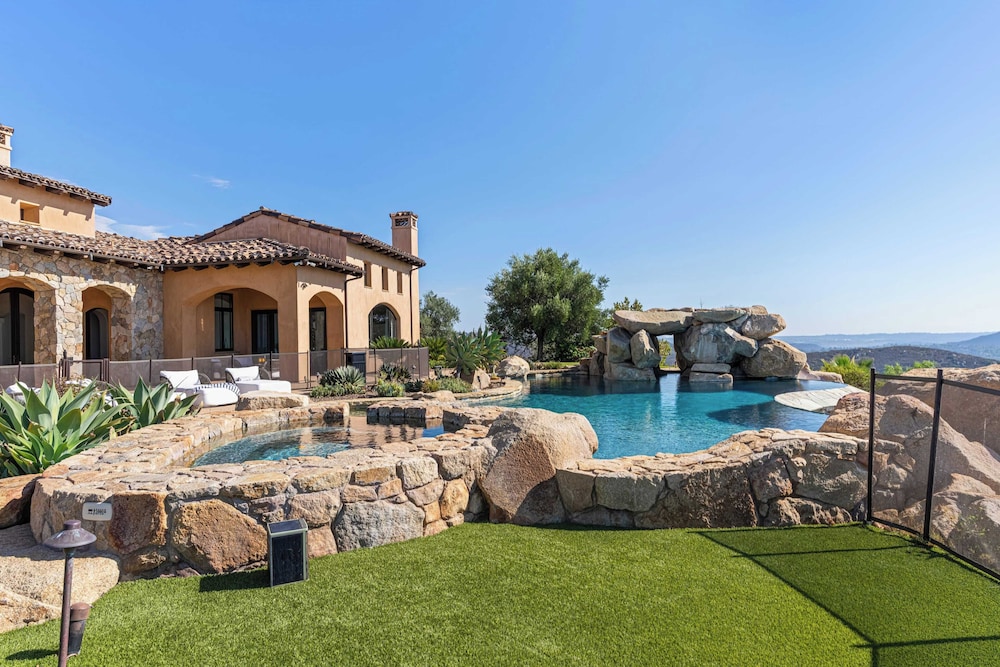 Infinity Pool, Theater, Pickleball + 360 Views Near Lake Poway Sunset Point Estate by Avantstay