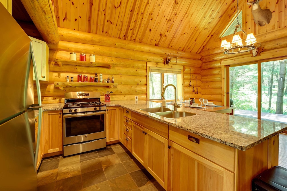 Secluded Log Cabin in NW Michigan: Hot Tub Deck - Property Image 26