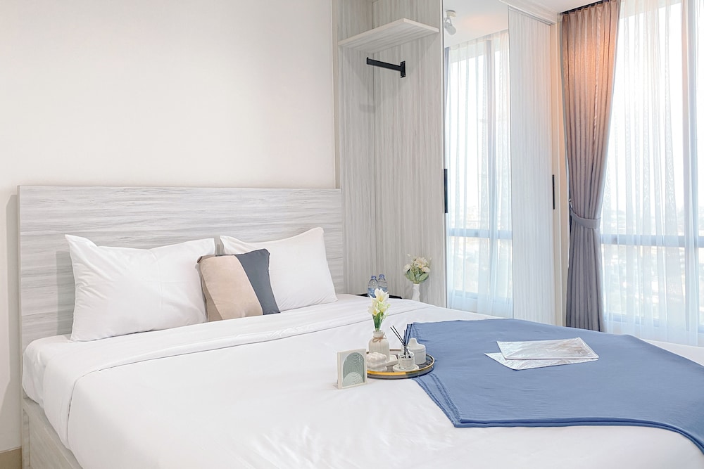 Simple White Designed Studio At Lrt City Bekasi Apartment