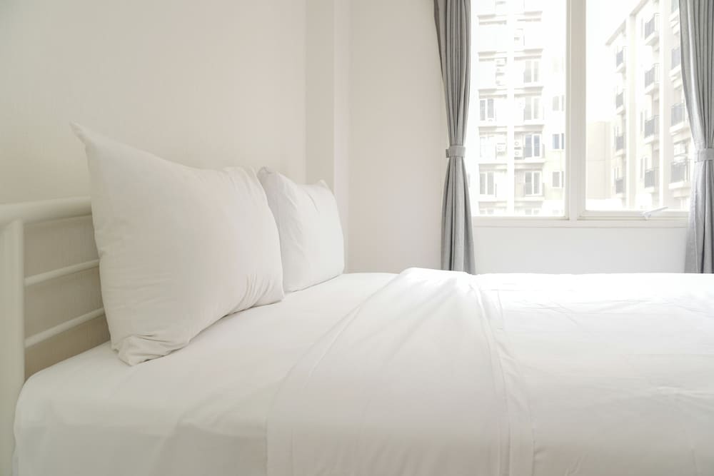 Minimalist and Restful 2BR at Podomoro Golf View Apartment
