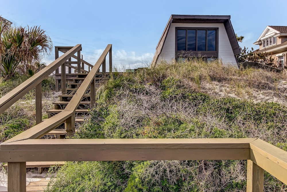 Roomy Chalet-Style Beachfront Condo with Private Beach Access by RedAwning
