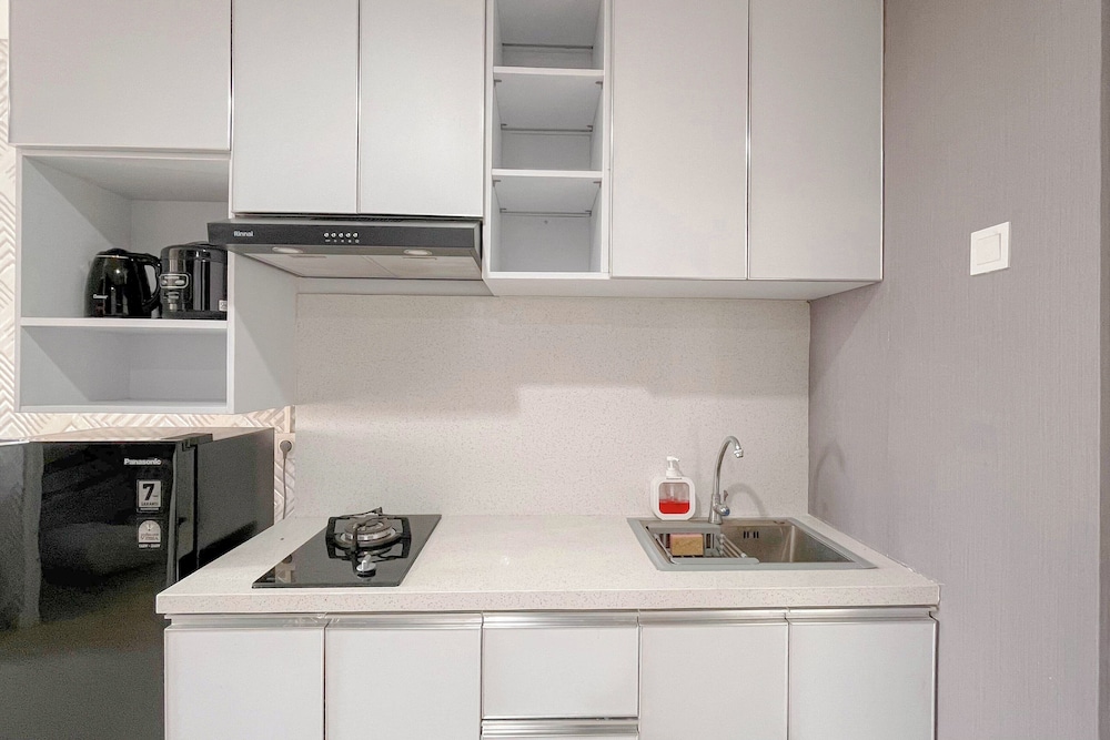 Grey Toned 1Br Apartment Tamansari Skylounge Makassar
