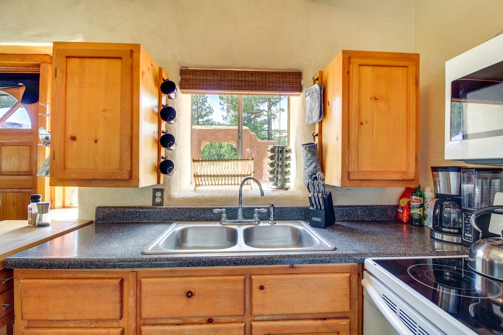 Secluded Ramah Cottage: Patios & Outdoor Fireplace view 5