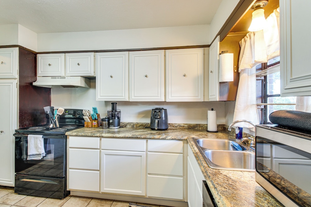 Easy OKC Access! Quiet Home w/ Yard & Workspace