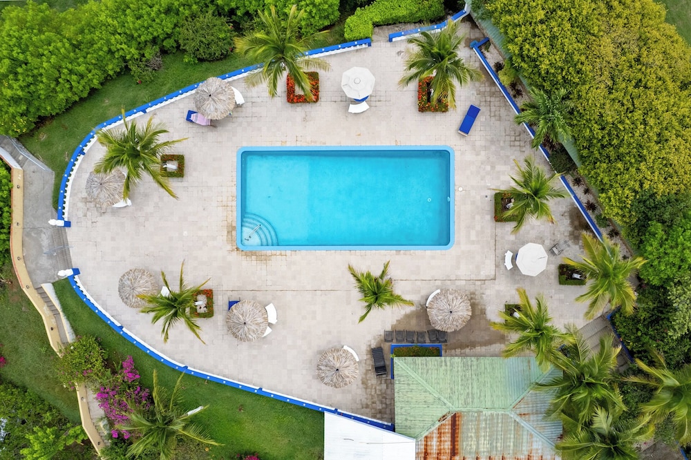 Modern Top-Floor Condo with Panoramic Views and Community Pool