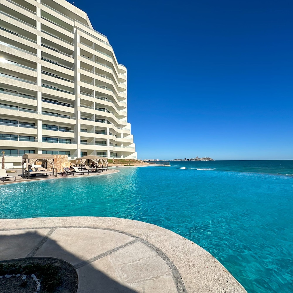 Brand-new Modern 2BR Gem on Iconic Sandy Beach