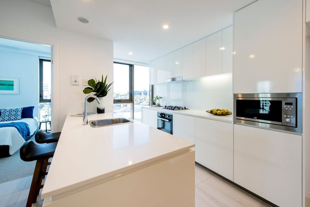 2BR Food Drink Hub Pool Balcony Gym Rooftop