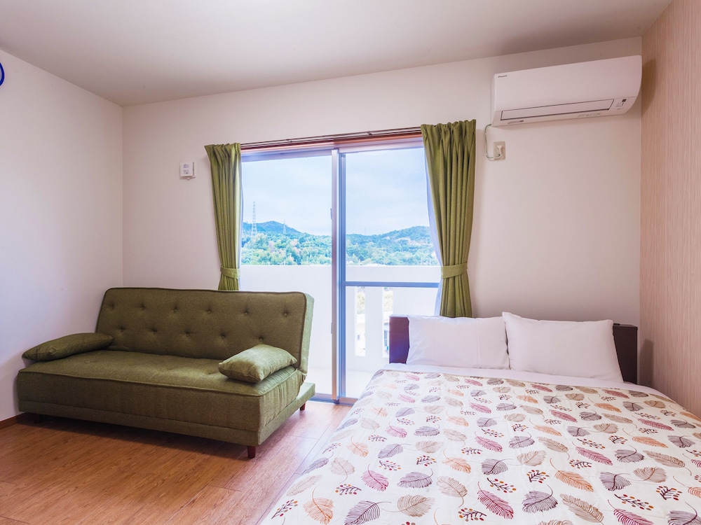 Kariyushi Condominium Resort Kin Yaka Seaside