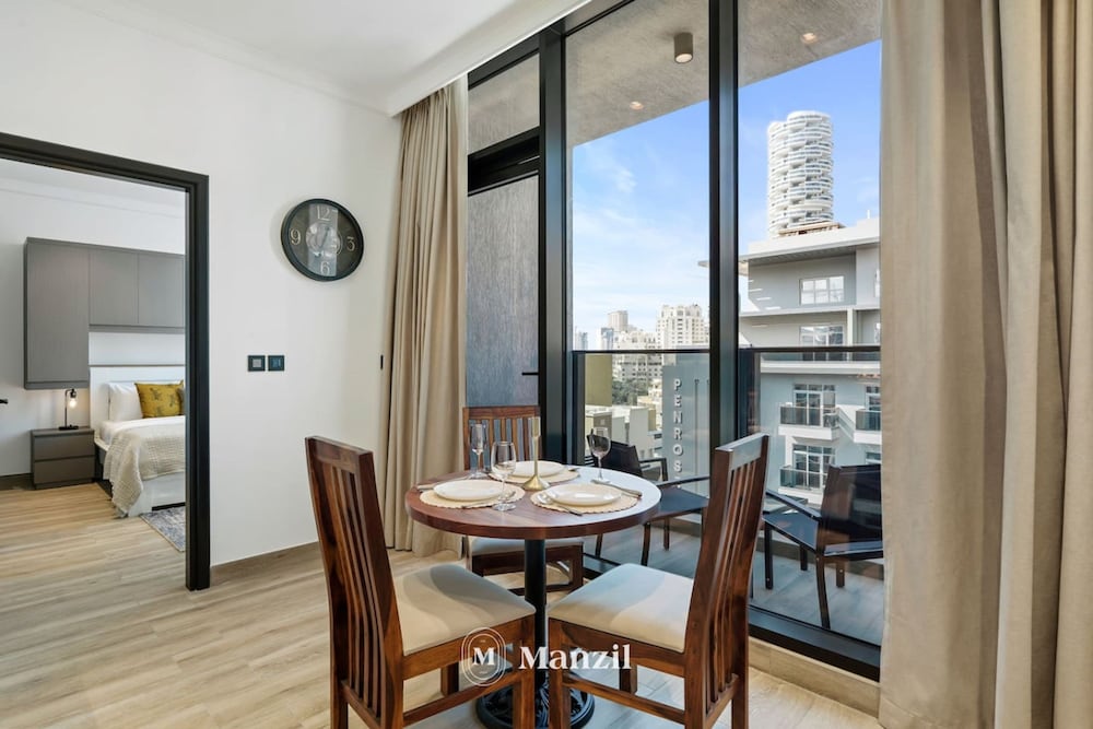 Stylish 1BR Apt w Pool in JVC nr Dubai Sports City